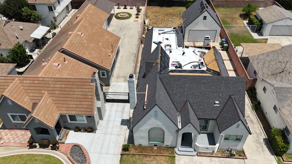 Aerial view of a completed architectural shingle roof replacement